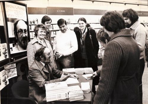 Eamonn MacThomáis signing copies of a later book in Easons (Image from the Facebook page Eamonn Mac Thomais, A legendary Dubliner)